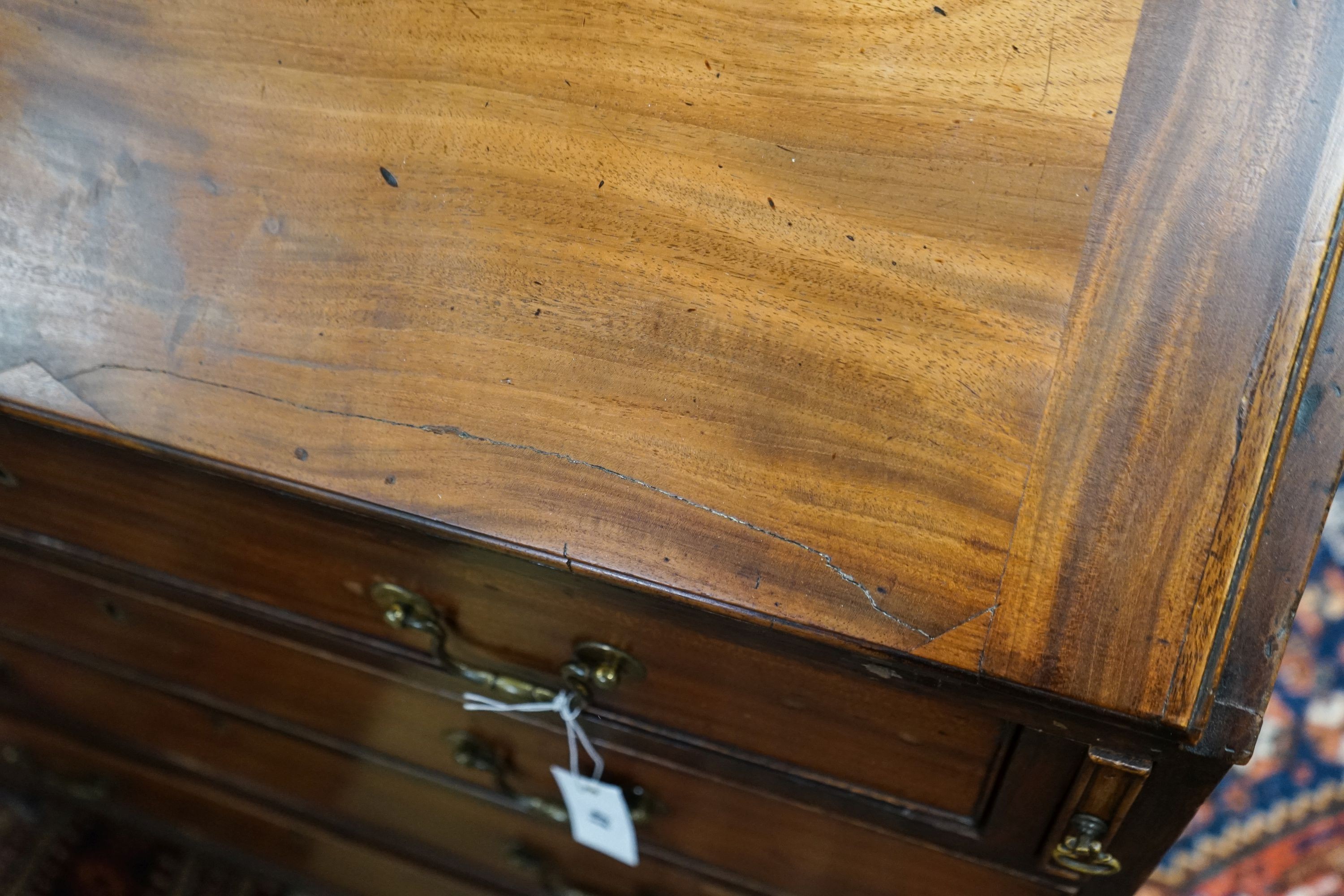 A George III mahogany bureau, with fall front and four drawers, width 91cm, depth 50cm, height 102cm